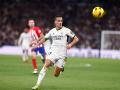 Lucas Vázquez en acción en un partido contra el Atlético de Madrid esta temporada