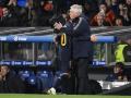 Ancelotti abraza a Modric el pasado viernes en Anoeta