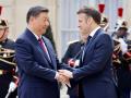 Macron y Xi Jinping en el palacio del Elíseo