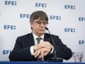 El expresidente de la Generalitat y cabeza de lista de JxCat, Carles Puigdemont, durante su participación este martes en el ciclo de ruedas de prensa organizado por la Agencia EFE con motivo de la campaña de las elecciones catalanas del 12 de mayo. EFE/David Borrat