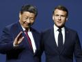 El presidente chino Xi Jinping junto con el francés Emmanuel Macron
