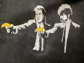 Fotografía del mural 'Pulp Fiction' del artista Bansky, este miércoles en el museo de Banksy, en Nueva York