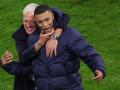 Didier Deschamps y Kylian Mbappé celebran la victoria frente a Portugal