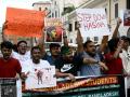 Students from Bangladesh take part to a demonstration to ask the Bangladesh government to end the crackdown on protesters opposing a controversial job allocation quota system, central Rome on July 22, 2024. More than 500 people, including some opposition leaders, have been arrested in Dhaka over violence that has wracked Bangladesh and killed 163 people since students started protesting against civil service hiring rules. (Photo by Filippo MONTEFORTE / AFP)