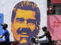 Graffiti con la imagen del actual presidente venezolano y candidato a la reelección, Nicolás Maduro