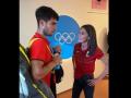 La Reina Letizia y Carlos Alcaraz conversando tras el partido