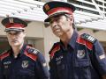 El Mayor de los Mossos d'Esquadra, Josep Lluis Trapero (d), acompañado por el comisario jefe del cuerpo, Eduard Sallent