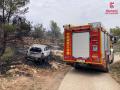 Imagen coche calcinado con un cadáver dentro en Castellón