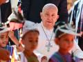 Pope Francis arrives for a visit to the Irmas Alma School for Children with Disabilities in Dili on September 10, 2024. (Photo by Tiziana FABI / AFP)