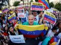 Venezolanos se manifiestan en la Plaza de las Cortes en Madrid para reivindicar la victoria en los comicios del pasado 28 de julio de Edmundo González Urrutia,