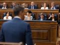 Pedro Sánchez, de espaldas, y Diana Morant, en el Congreso de los Diputados