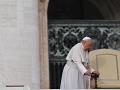 Pope Francis using a walking stick arrives for the weekly general audience at Saint Peter's Square  in The Vatican on October 16, 2024. (Photo by Andreas SOLARO / AFP)