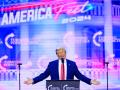 El presidente electo de Estados Unidos, Donald Trump, habla durante el AmericaFest 2024