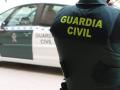 Un agente de la Guardia Civil, de espaldas, junto a un vehículo oficial.
GUARDIA CIVIL
(Foto de ARCHIVO)
01/1/1970
