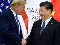 El presidente de los EE.UU., Donald Trump (Iz), con el presidente de China, Xi Jinping en una imagen de archivo