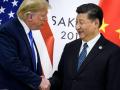 El presidente de los EE.UU., Donald Trump (Iz), con el presidente de China, Xi Jinping en una imagen de archivo