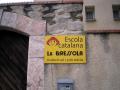 Cartel de la escuela La Bressola en Prada de Conflent, en Francia