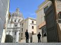Gendarmes stand near the entrance of Pope Francis residence Santa Marta in the Vatican on the day he will be discharged from the Gemelli hospital following a five weeks hospitalization for pneumonia, on March 23, 2025. Pope Francis is to leave hospital todayand return to his residence in the Vatican, where he is to spend "at least two months" recovering, one of his doctors announced during a press conference on March 22, 2025. (Photo by Alberto PIZZOLI / AFP)