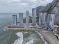 Así lucen las seis torres 'Terrazas del Centenario de Hassan', levantadas sobre rellenos en aguas españolas