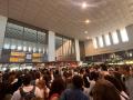 Viajeros aguardan información en la estación sevillana de Santa Justa