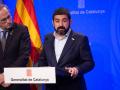 El que fuera consejero de Trabajo y Asuntos Sociales, Chakir el Homrani, de ERC, junto al expresidente de la Generalitat Quim Torra