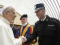 This handout made available by The Vatican Media on May 24, 2025, shows Pope Leo XIV greeting a member of the Gendarmeria before his audience with the Roman Curia and Vatican employees at The Vatican. Pope Leo XIV took his message of building bridges and promoting dialogue to the Roman Curia on May 24, in his first audience with members of the Catholic Church's governing body. (Photo by Simone Risoluti / VATICAN MEDIA / AFP) / RESTRICTED TO EDITORIAL USE - MANDATORY CREDIT "AFP PHOTO / VATICAN MEDIA" - NO MARKETING - NO ADVERTISING CAMPAIGNS - DISTRIBUTED AS A SERVICE TO CLIENTS