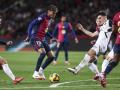 Imagen de una acción del último encuentro de liga entre el F.C. Barcelona y el Valencia C.F.