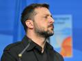 El presidente de Ucrania, Volodymyr Zelensky, reacciona durante una cumbre de la OTAN en La Haya