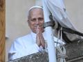 Pope Leone XIV waves the people from the terrace of the summer papal estate where he arrives for a two-week stay in Castel Gandolfo, 40 km southeast of Rome, on July 6, 2025. The newly elected Pope Leo XIV, revives a long-standing papal tradition paused under Francis, as Castel Gandolfo prepares to welcome a pope for the first time in over a decade. (Photo by Andreas SOLARO / AFP)