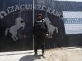 Fotografía de archivo del 20 de marzo de 2025 de un integrante de la fiscalía estatal resguardando la entrada al Rancho Izaguirre en el municipio de Teuchitlán, Jalisco (México). Los diez detenidos en septiembre de 2024 en el rancho Izaguirre, vinculado con un cartel del narcotráfico en el municipio de Teuchitlán, estado de Jalisco