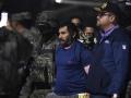 El narcotraficante Adolfo Macías, alias Fito, custodiado por el ministro del Interior de Ecuador, John Reimberg