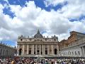 Worshippers gather in front of the Basilica at St. Peter's square as Pope Leo XIV addresses the crowd from the window of the Apostolic Palace during his Angelus prayer at the Vatican on July 26, 2025. (Photo by Alberto PIZZOLI / AFP)