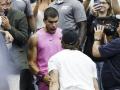 Carlos Alcaraz y Juan Carlos Ferrero celebran el triunfo del murciano en el US Open