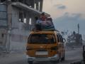 Una familia de palestinos abandona Ciudad de Gaza en plena ofensiva israelí