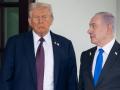 US President Donald Trump greets Israeli Prime Minister Benjamin Netanyahu as he arrives at the West Wing of the White House in Washington, DC on September 29, 2025. US President Donald Trump will push Israeli Prime Minister Benjamin Netanyahu to agree to an elusive Gaza peace plan on Monday in high-stakes talks at the White House. (Photo by SAUL LOEB / AFP)