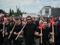 Manifestantes durante la huelga contra la jornada laboral de 13 horas en Grecia.
