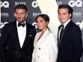 Designer and former singer Victoria Beckham and David Beckham with their son Brooklyn Beckham at the GQ Men of the year Awards in central London on Tuesday, Sept. 3, 2019.  *** Local Caption *** .