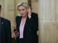 Marine Le Pen líder de Agrupación Nacional saliendo del Tribunal de Apelaciones de París