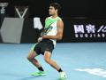 Carlos Alcaraz sonríe durante la final del Open de Australia 2026