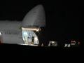Members of the US military offload equipment from a US Air Force C-5 Galaxy at RAF Fairford in south west England on March 6, 2026. Britain's Prime Minister Keir Starmer has given approval for Washington to use the bases of Diego Garcia in the Indian Ocean and RAF Fairford in southwest England to bomb Iranian missile sites, after several Gulf countries were targeted by Iranian retaliations. (Photo by JUSTIN TALLIS / AFP)