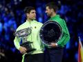 Carlos Alcaraz y Novak Djokovic tras la final del Open de Australia 2026