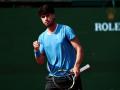 Spain's Carlos Alcaraz celebrates a point against Monaco's Valentin Vacherot during the Monte Carlo ATP Masters Series Tournament semi-final tennis match on Court Rainier III at the Monte-Carlo Country Club in Roquebrune-Cap-Martin, south-eastern France on April 11, 2026. (Photo by Thibaud MORITZ / AFP)