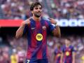 Barcelona's Spanish forward #07 Ferran Torres celebrates scoring his team's second goal during the Spanish league football match between FC Barcelona and RCD Espanyol at the Camp Nou stadium in Barcelona on April 11 , 2026. (Photo by Josep LAGO / AFP)
