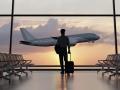 Silhouette of a man walking in the airport as the plane takes off during sunset. 3D illustration