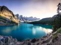 The emerald waters of Moraine Lake at sunset.  A panoramic photo.