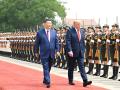 Donald Trump y Xi Jinping durante la ceremonia de bienvenida en Pekín