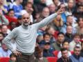 Manchester City's Spanish manager Pep Guardiola gestures instructions to the players from the touchline during the English FA Cup final football match between Chelsea and Manchester City at Wembley stadium in London, on May 16, 2026. (Photo by Adrian Dennis / AFP) / NOT FOR MARKETING OR ADVERTISING USE / RESTRICTED TO EDITORIAL USE