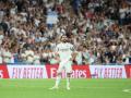 Real Madrid's Spanish defender #02 Dani Carvajal applauds as he leaves the pitch after his last match with Real Madrid during the Spanish league football match between Real Madrid CF and Athletic Club Bilbao at Santiago Bernabeu Stadium in Madrid on May 23, 2026. (Photo by Pierre-Philippe MARCOU / AFP)