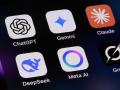 Toronto, Canada - May 9, 2025:  AI assistant apps on a smartphone - OpenAI ChatGPT, Google Gemini, Anthropic Claude, DeepSeek, Meta AI, and xAI Grok.