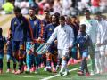 Rodri, Lionel Messi y sus compañeros de equipo saltan al terreno de juego antes de la final del Mundial de fútbol de 2026 entre España y Argentina